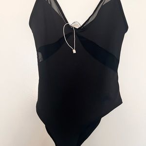 Zara bodysuit. New without tag. Size small.
